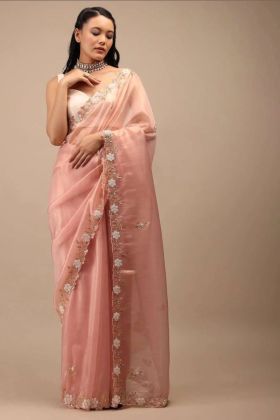 Zimmy Chu Saree in light orange with intricate hand and cutwork
