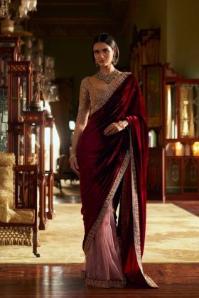 Velvet-net saree in maroon with embellishments, thread, and sequins