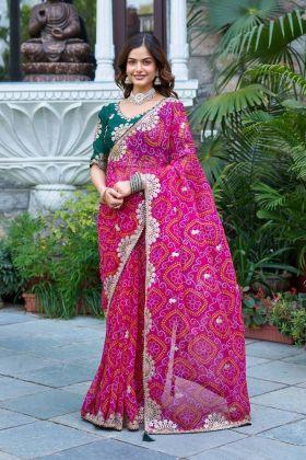 Heavy Pitha and Gota Patti Work on a Rani Pure Bandhej Saree