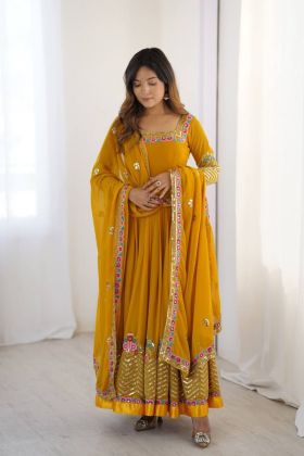 Sequin embroidery on a yellow heavy georgette anarkali gown set 
