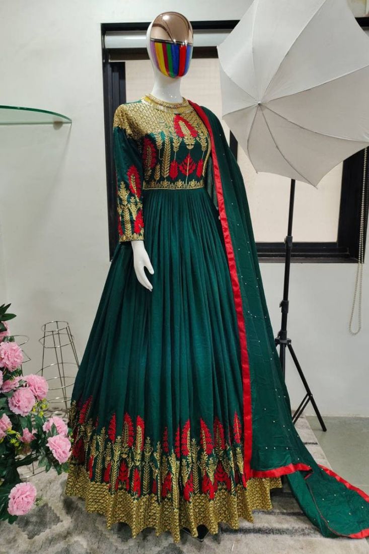 Bottle green gown with shoulder cape available only at IBFW